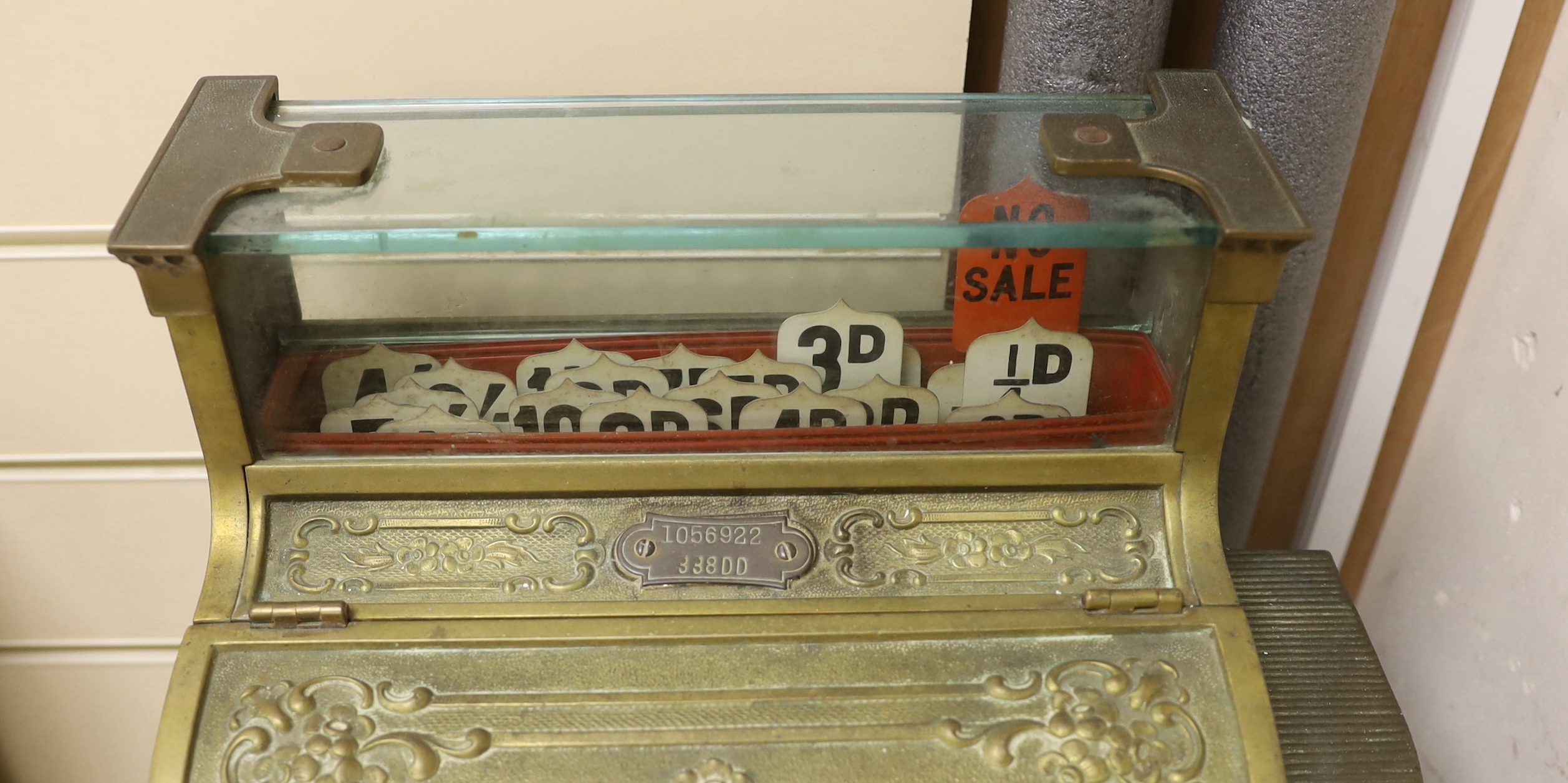 An ornamental brass National shop till, 43cm high